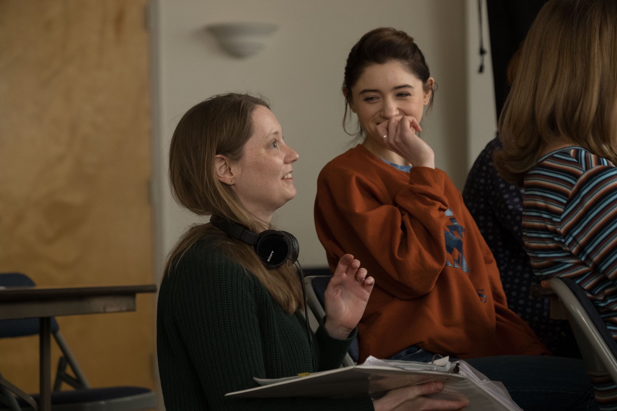 Photo of Karen Maine & Natalia Dyer on set of the Yes, God, Yes feature